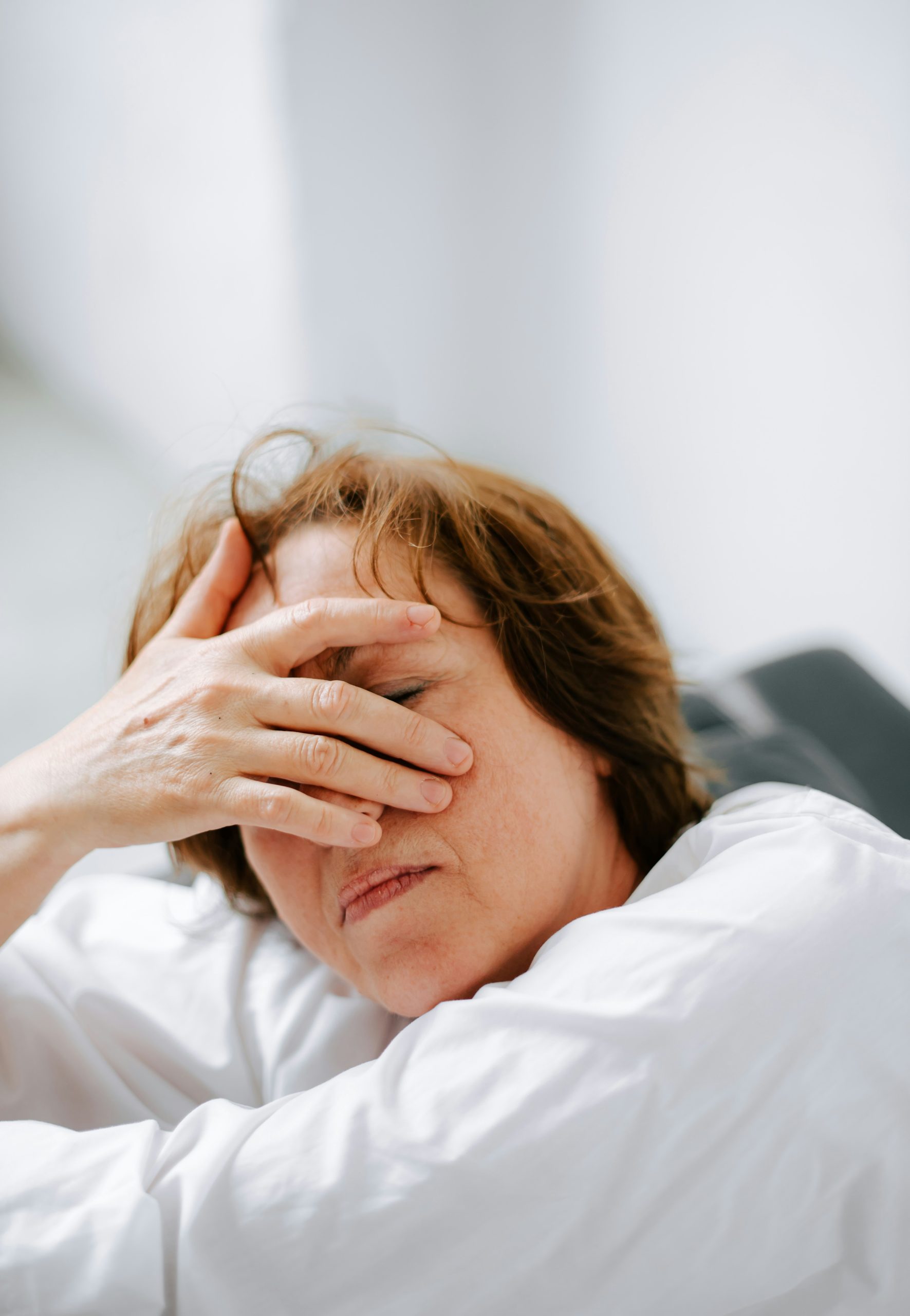 Woman experiencing menopause symptoms